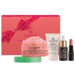 Unbox Your Uniqueness zestaw pomadka do ust 102 1.2ml + krople samoopalające do twarzy 10ml + przeciwzmarszczkowy krem wygładzający 15ml + ujędrniający peeling do ciała 70g